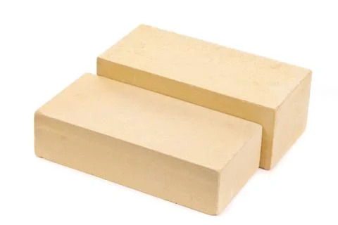 Two yellow ceramic bricks at the white background, isolated Stock Photos