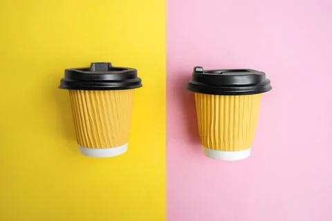 Two yellow coffee cups Stock Photos