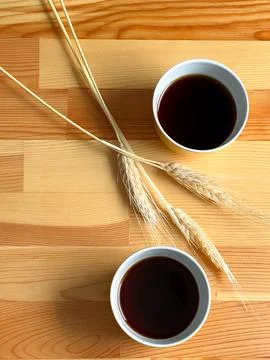 Two yellow coffee cups on the table Foto stock