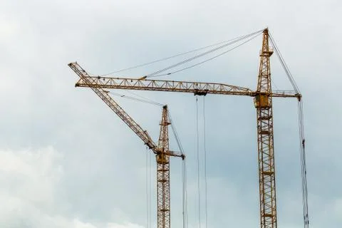 Two yellow construction crane Stock Photos