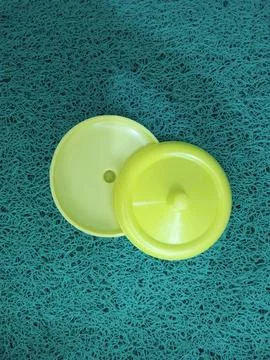 Two Yellow Cup Lids 스톡 사진