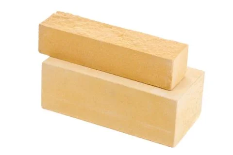Two yellow long ceramic bricks at the white background, isolated Stock Photos