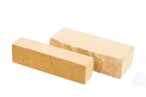 Two yellow long ceramic bricks at the white background, isolated Stock Photos