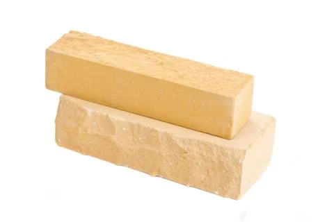 Two yellow long ceramic bricks at the white background, isolated Stock Photos