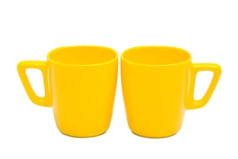 Two yellow mug Stock Photos
