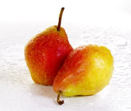 Two yellow-red pears on a white background Stock Photos