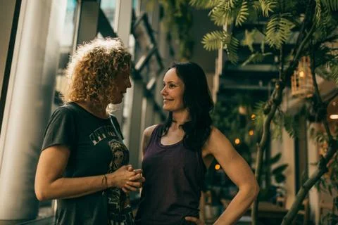 Two yoga trainers having a chat Stock Photos