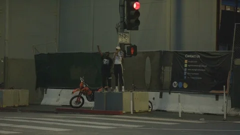 Two young adults protesting on the street, BLM, Downtown, LA, June 3 2020 Video stock 136749589