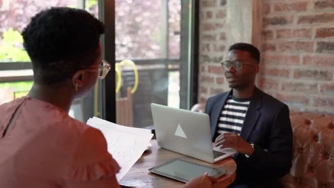 Two young African American having a business meeting. Video stock 155808970