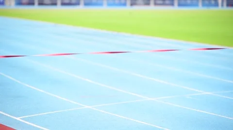 Two young Asian boy running on blue track to the finished line. Vídeos de archivo 67191065
