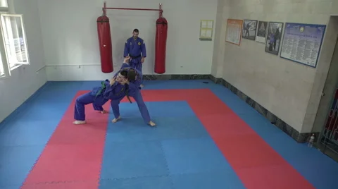 Two young athletes performing real aikido techniques by Pakito. Stock Footage 63153329