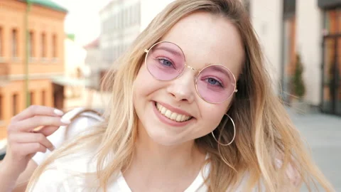 Two young beautiful blond smiling hipster girls Stock Footage 141243598