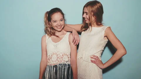 Two young beautiful smiling hipster girls Видео 140515962