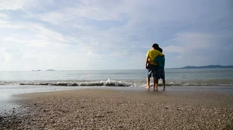 Two young boys standing on the beach Video stock 57831728