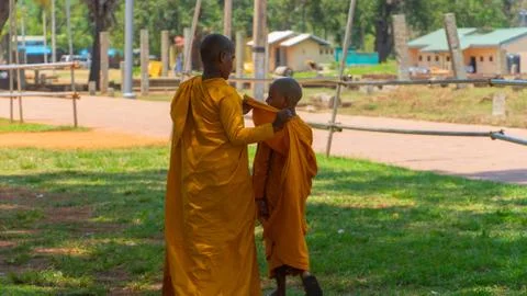 Two Young Buddhist Monks Photos