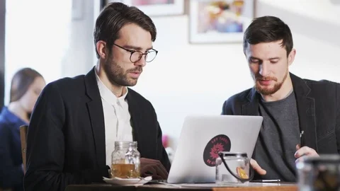 Two Young Business People During a Business Talk Stock Footage 71606145