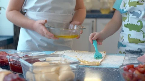 Two young chefs prepare pizza Stock Footage 124853228