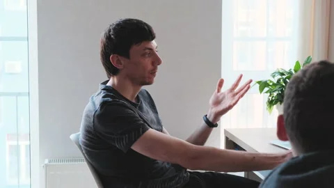 Two young entrepreneurs discuss development strategy of sitting at home 動画素材 135743518