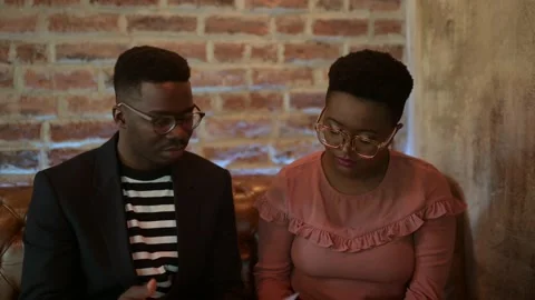 Two young freelancers having a discussion at the bar Stock-Footage 155542597