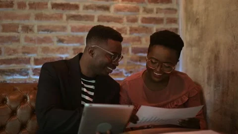 Two young freelancers working at a coffee shop Stock-Footage 155542460