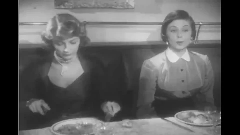 Two young French couples begin their appetizers and cheers their drinks at a Stock Footage 116495356