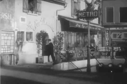 Two young French couples order food at a restaurant in this black and white Stock Footage 90404919