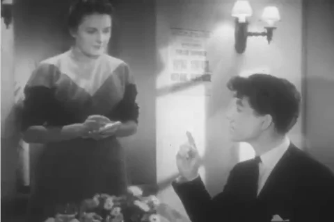 Two young French couples order food at a restaurant in this black and white Stock Footage 90404921