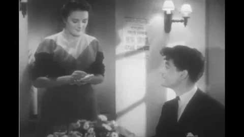 Two young French couples order food at a restaurant in this black and white Stock Footage 116495574