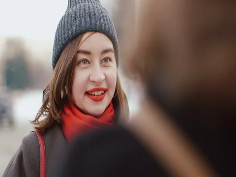 Two Young Friends Walking Through Street In Winter City Stock Footage 72485496