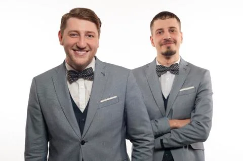 Two young funny men in formal clothes Stock Photos