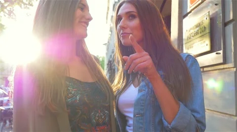 Two young girl talking on the street. Stock Footage 65397953
