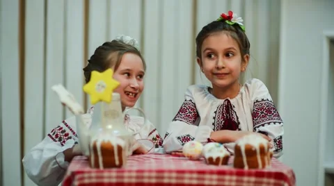 Two young girls decorating Easter eggs Stock Footage 48376358