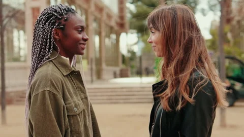 Two young girls talking, dialog of two girlfriends, couple, lesbians Stock Footage 302115670