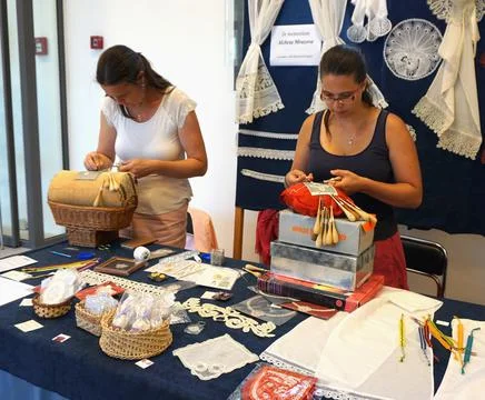 Two young lace-maker on 9th international lave festival Stock Photos