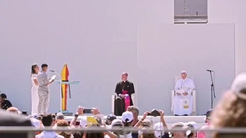 Two Young Latin Americans Reading Speech to Pope on Stage in Tenerife Stock Footage 343460732