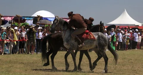 Two young men face off in horse riding. Stock Footage 105555964