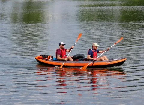 Two young men kayaking Stock Photos