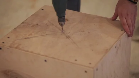 Two young men make a box of wood Stock Footage 86823677