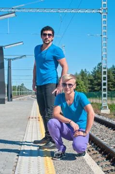 Two young men standing on the platform Stock Photos