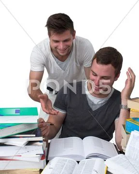 Two young men studying together Stock Photos