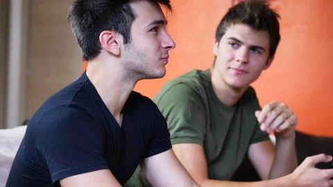 Two young men talking and chatting Stock Photos