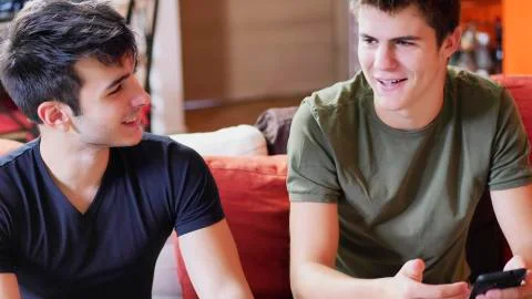 Two young men talking and chatting Stock Photos