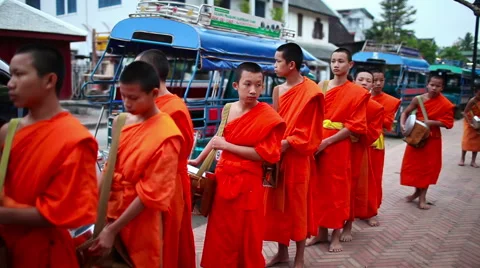 Two young monks walking street Stock Footage 62531696