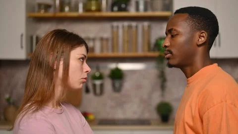 Two young people converge at one point and look at each other with displeasure Stock Footage 287161087