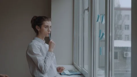 Two young professionals are working together on a project. Stock Footage 88649015