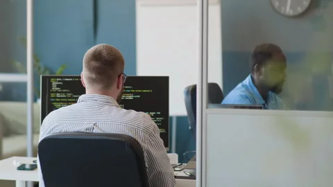 Two Young Programmers At Work In Office Stock Footage 283205136