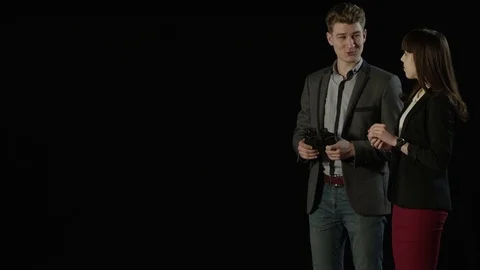 Two young students stand and watch through binoculars into the distance Stock Footage 77742334
