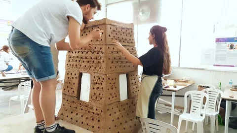 Two young students working on a sculpture at the 12th International Eskisehir Stock Footage 104032008