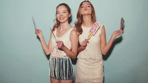 Two young stylish smiling blond women Stock Footage 140515690