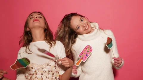 Two young stylish smiling blond women Stock Footage 140545696